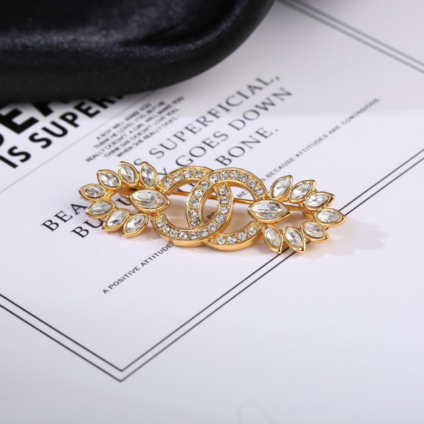 CL BROOCH